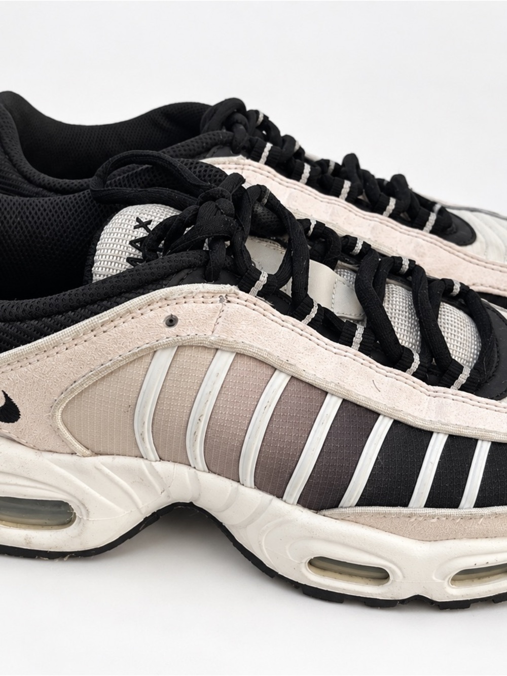 Nike Air Max Tailwind IV sneakers in a white/cream, gray and black colorway